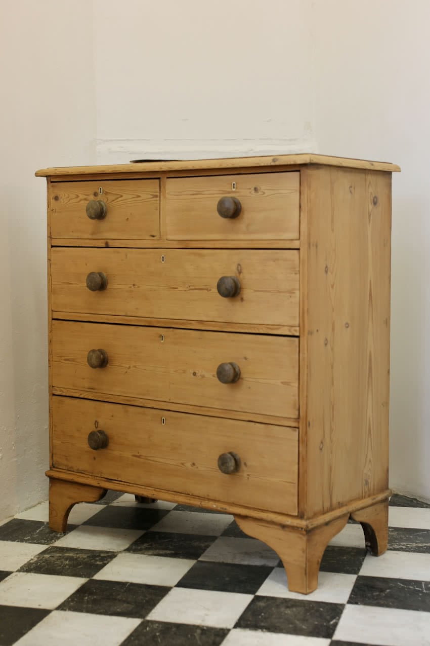 very early possibly georgian rustic looking country pine chest, restored with eight contrasting wooden knobs & beautiful shaped feet.