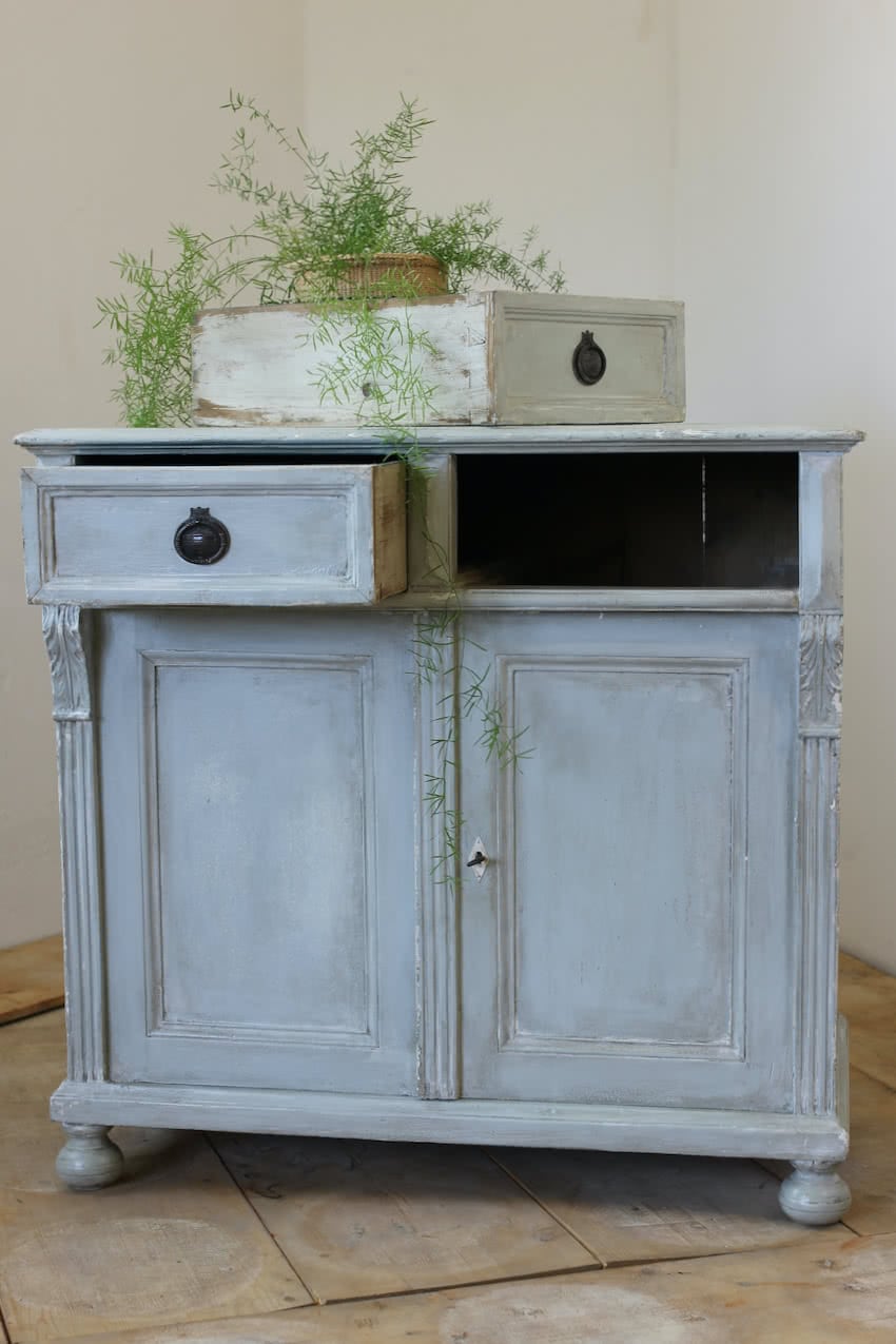 blue two drawer european pine cupboard base with a shelf inside and part painted interior, old handles & turned feet.blue two drawer european pine cupboard base with a shelf inside and part painted interior, old handles & turned feet.