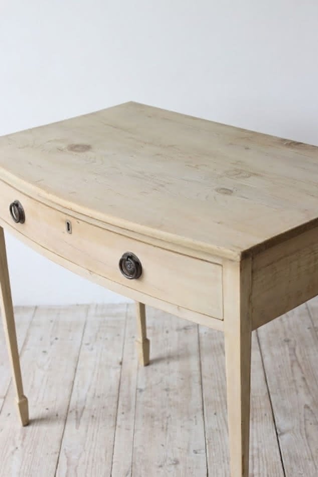 beautiful georgian restored pine table with large drawer, a lovely bleached look & sitting on slim tapered legs.