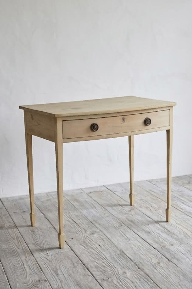 beautiful georgian restored pine table with large drawer, a lovely bleached look & sitting on slim tapered legs.