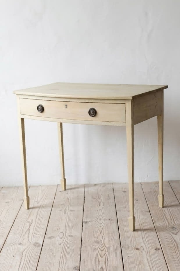 beautiful georgian restored pine table with large drawer, a lovely bleached look & sitting on slim tapered legs.