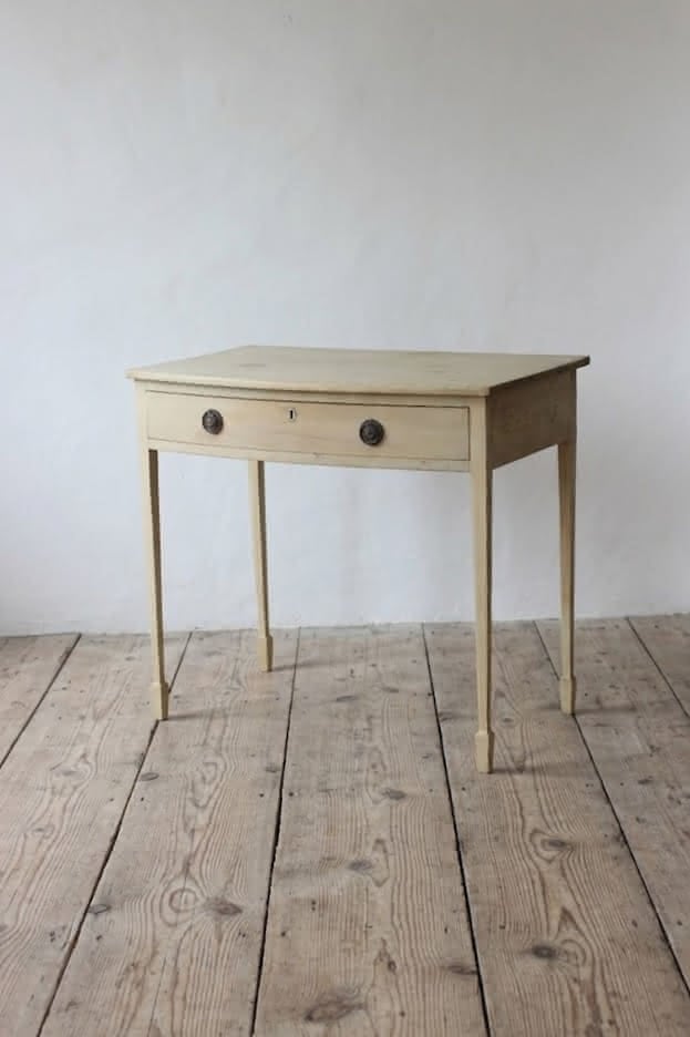 beautiful georgian restored pine table with large drawer, a lovely bleached look & sitting on slim tapered legs.