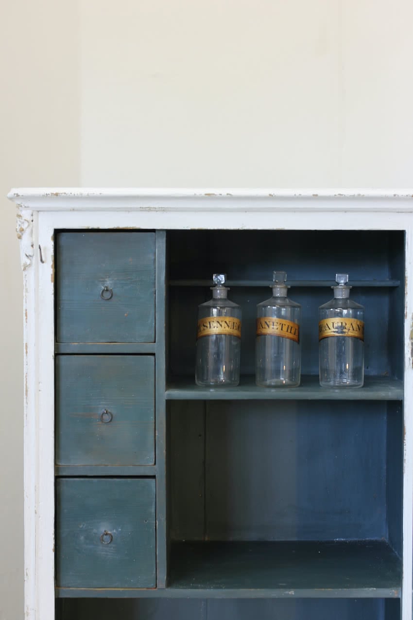 very pretty european pine cupboard with shelves and drawers, painted blue interior, brass air vent, pretty detailing & cute feet.