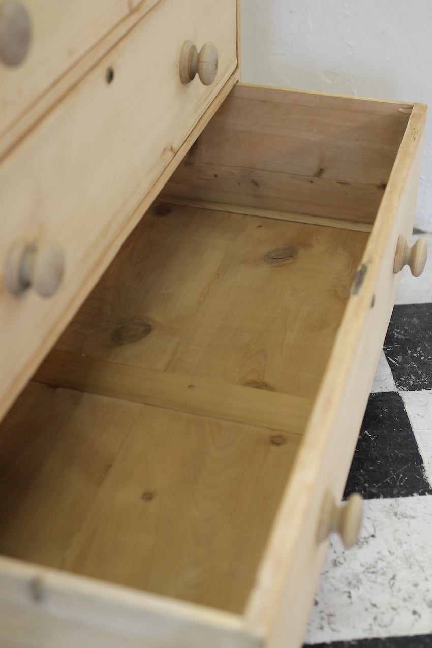 restored large blonde coloured victorian pine chest with five graduating drawers & large wooden knobs, the chest sits on a lovely shaped plinth, repair on the top.