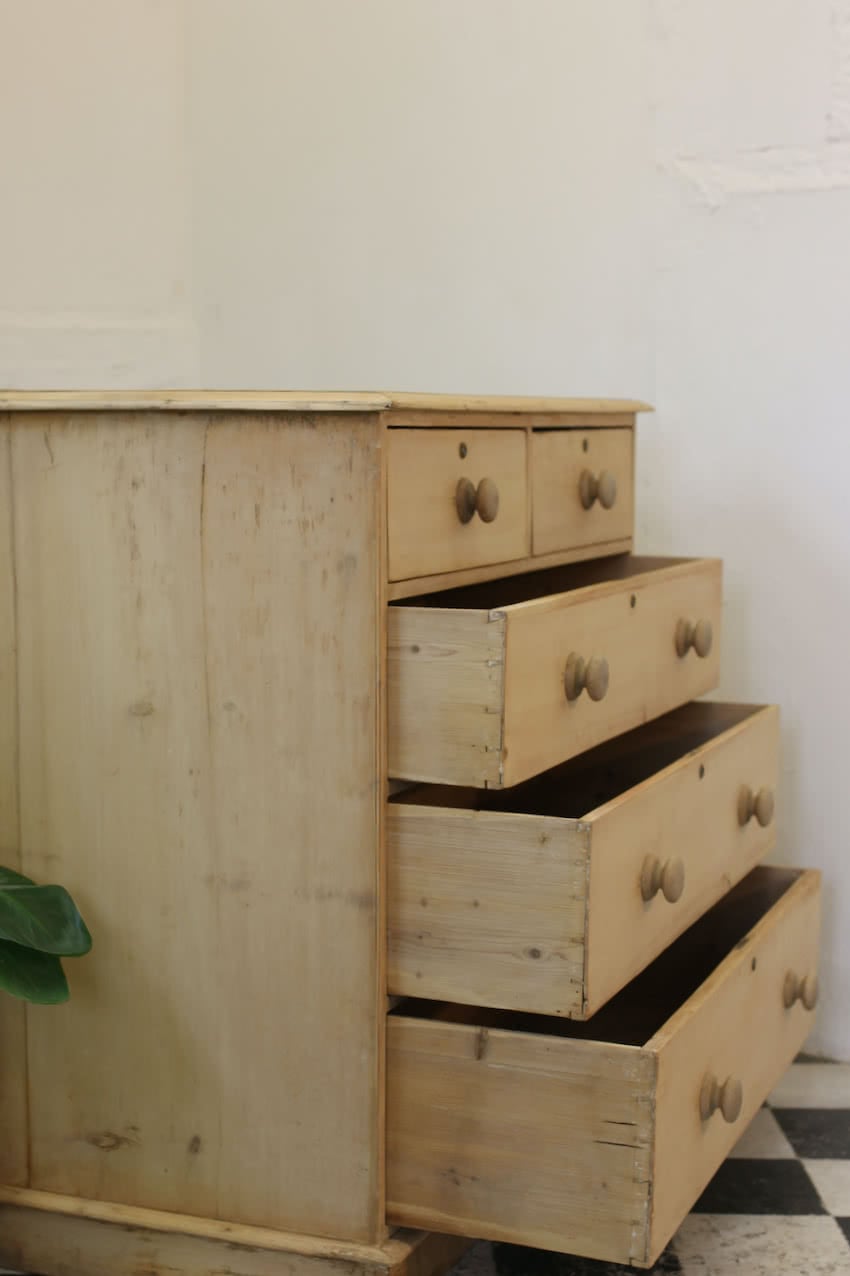 restored large blonde coloured victorian pine chest with five graduating drawers & large wooden knobs, the chest sits on a lovely shaped plinth, repair on the top.