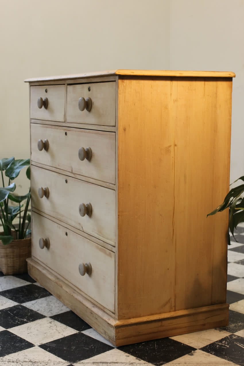 restored large blonde coloured victorian pine chest with five graduating drawers & large wooden knobs, the chest sits on a lovely shaped plinth, repair on the top.