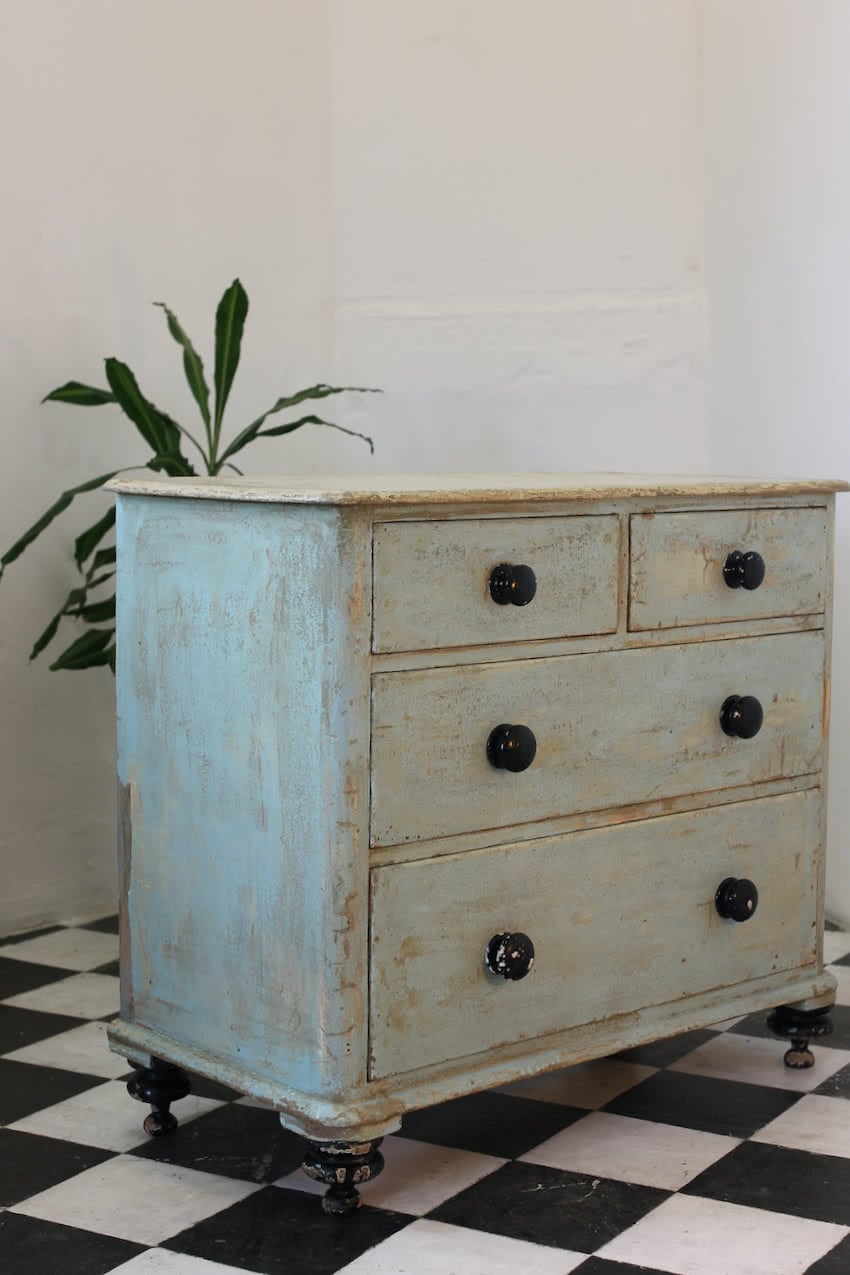 beautiful early victorian pine chest which has been scraped to reveal the original old paint, original feet and black contrasting knobs.
