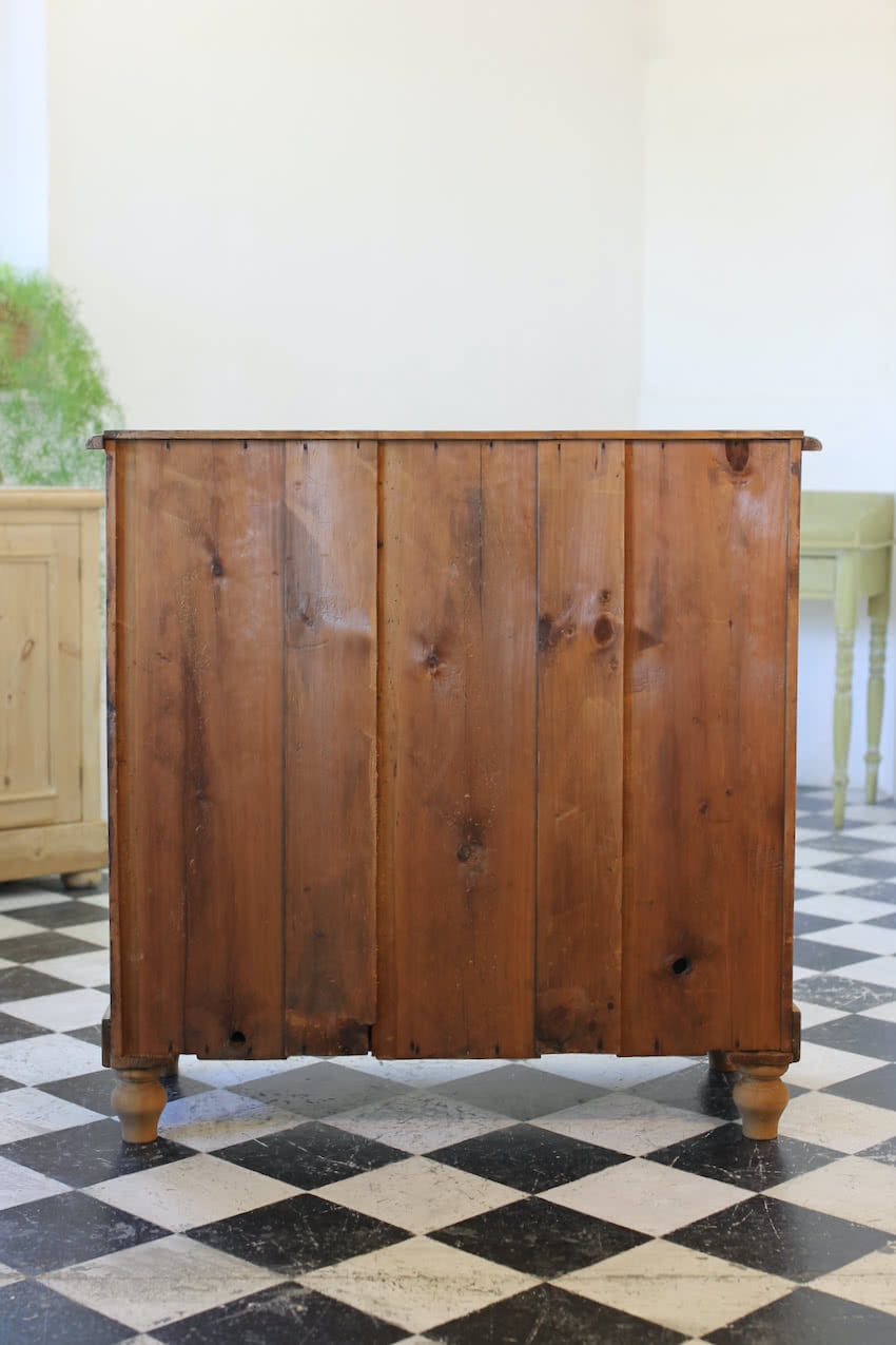 beautiful restored tall large victorian chest with five graduating drawers, original knobs & new feet. 