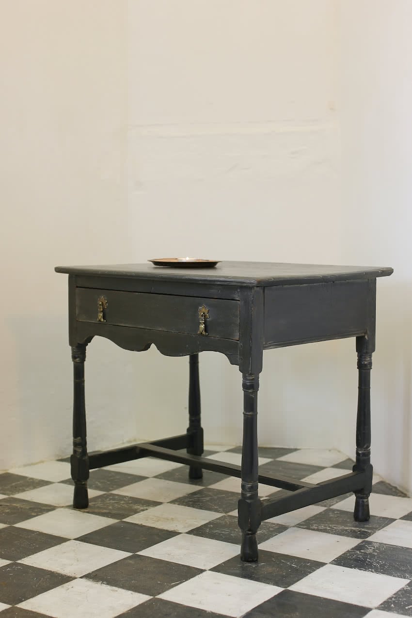 very pretty black restored & refinished one drawer table with painted green interior & gorgeous brass handles and a waxed finish.