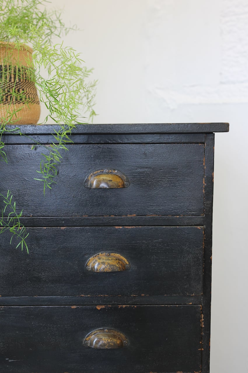 gorgeous restored & painted black pine tall chest of drawers, with dividers in every drawer, original cup handles & sits on a large plinth at base.
