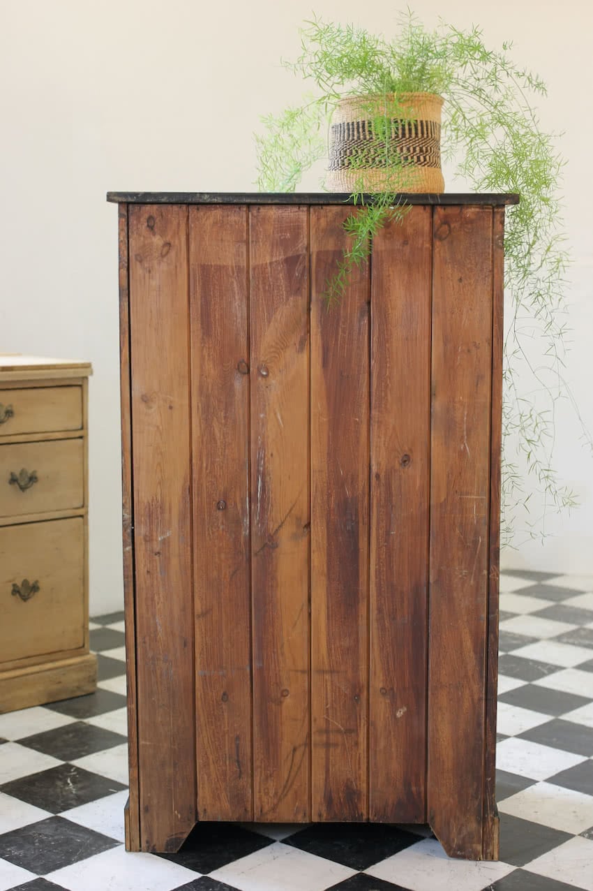 gorgeous restored & painted black pine tall chest of drawers, with dividers in every drawer, original cup handles & sits on a large plinth at base.