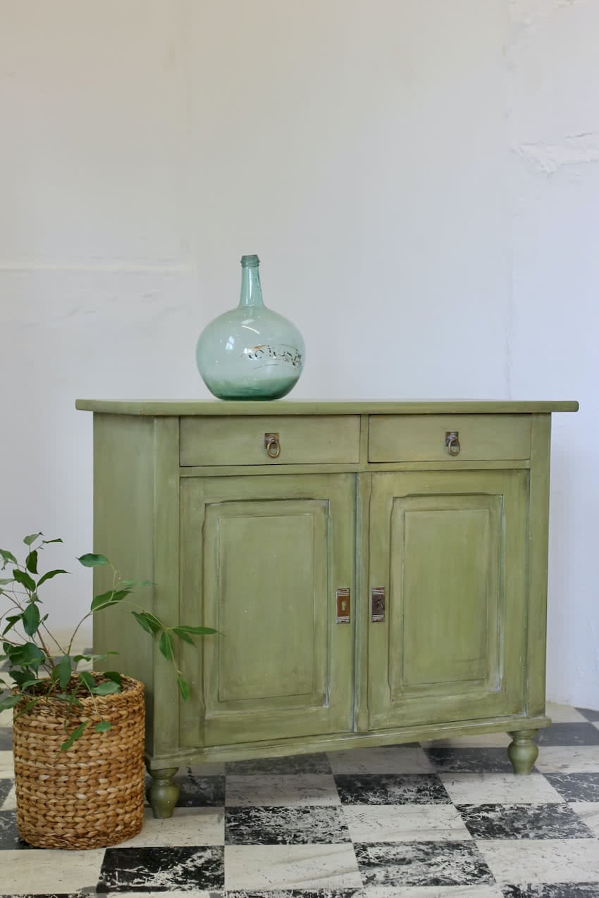 pretty antique pine two drawer painted green cupboard base with part painted pink interior, pine shelf inside & small turned feet.