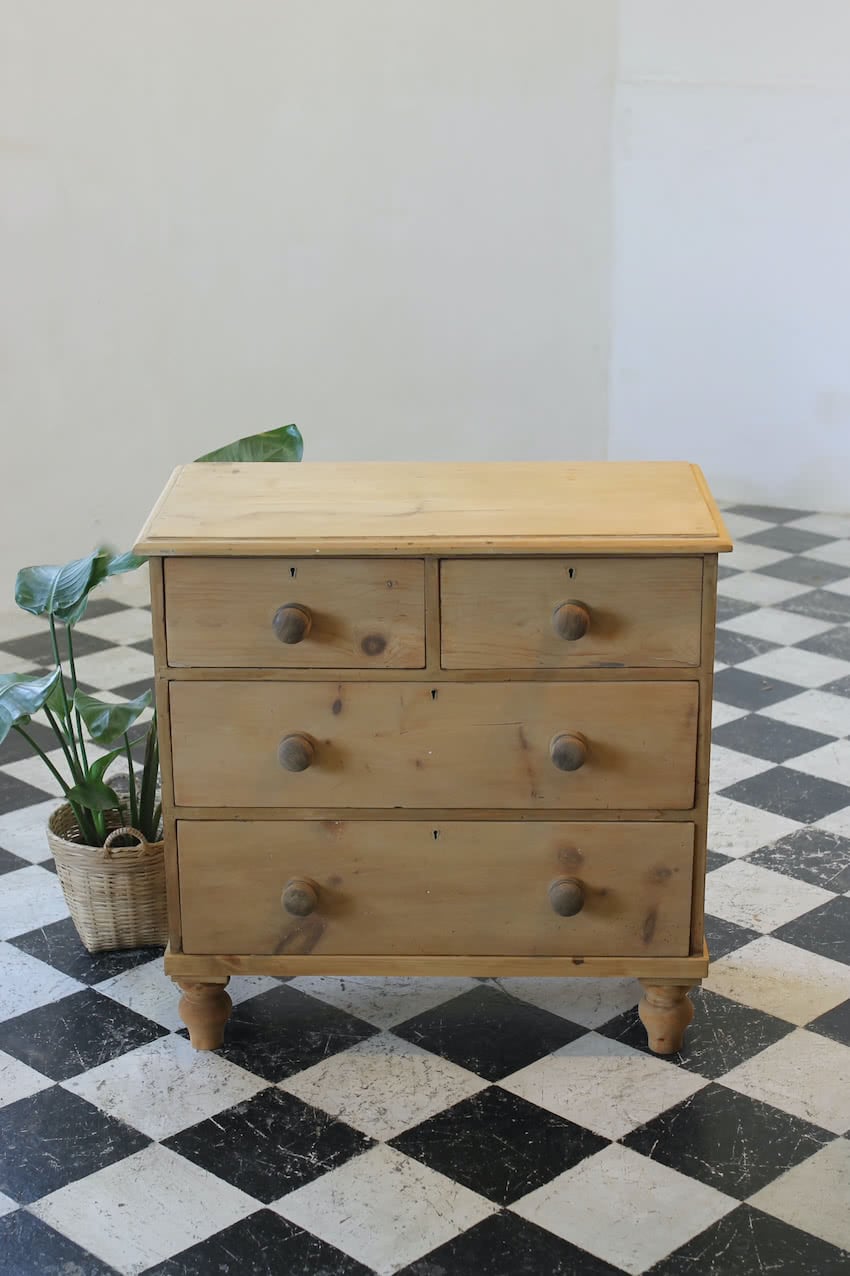 english four drawer antique pine chest completey restored with new knobs and feet of the period.