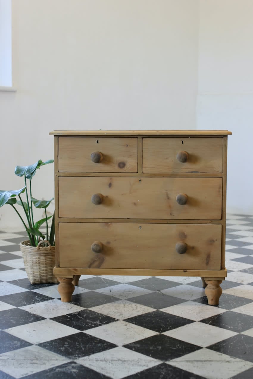 english four drawer antique pine chest completey restored with new knobs and feet of the period.