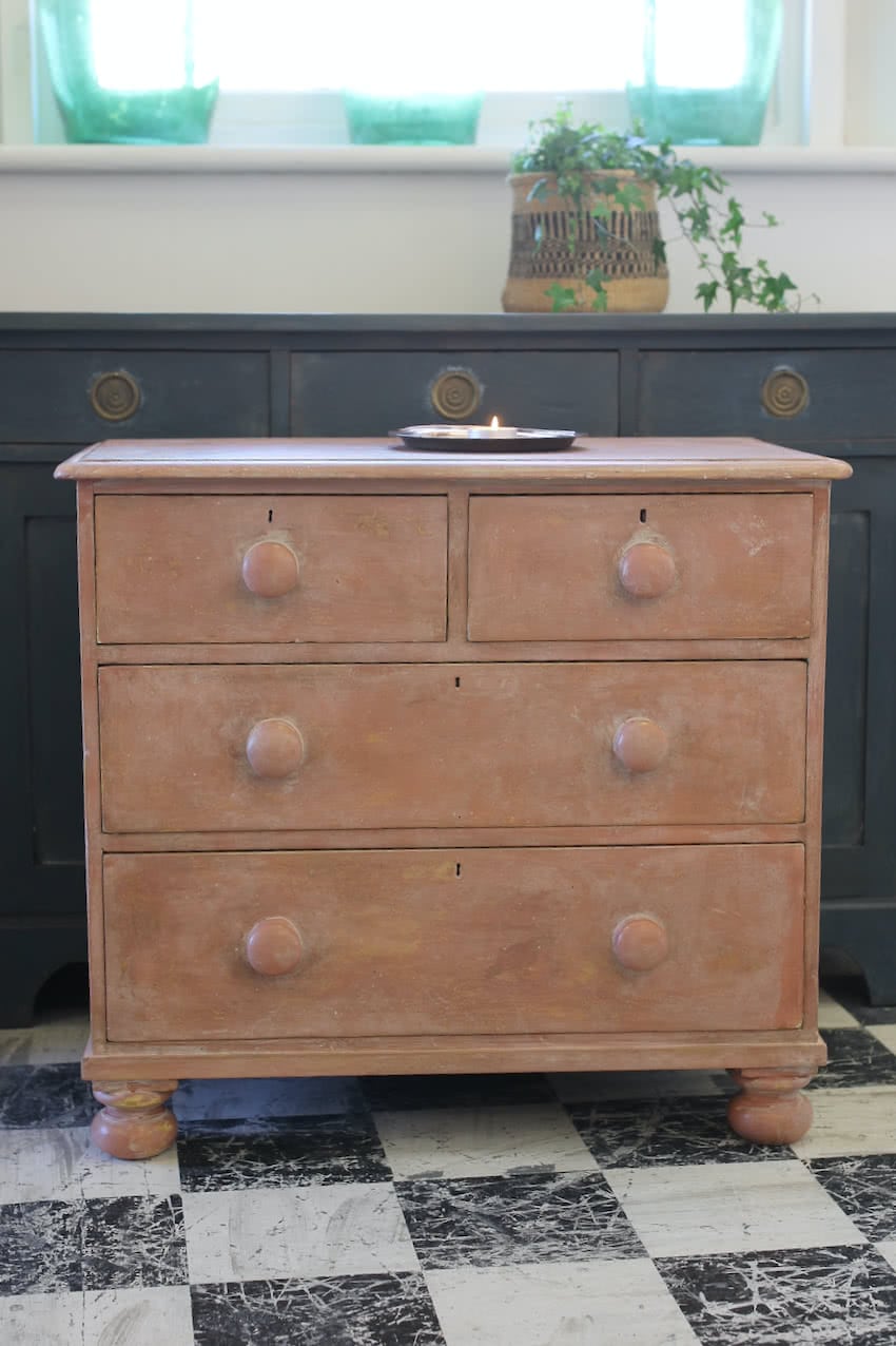 pretty cute victorian painted pine chest of drawers restored, refinished in pink, the chest has large original wooden knobs & large turned feet.