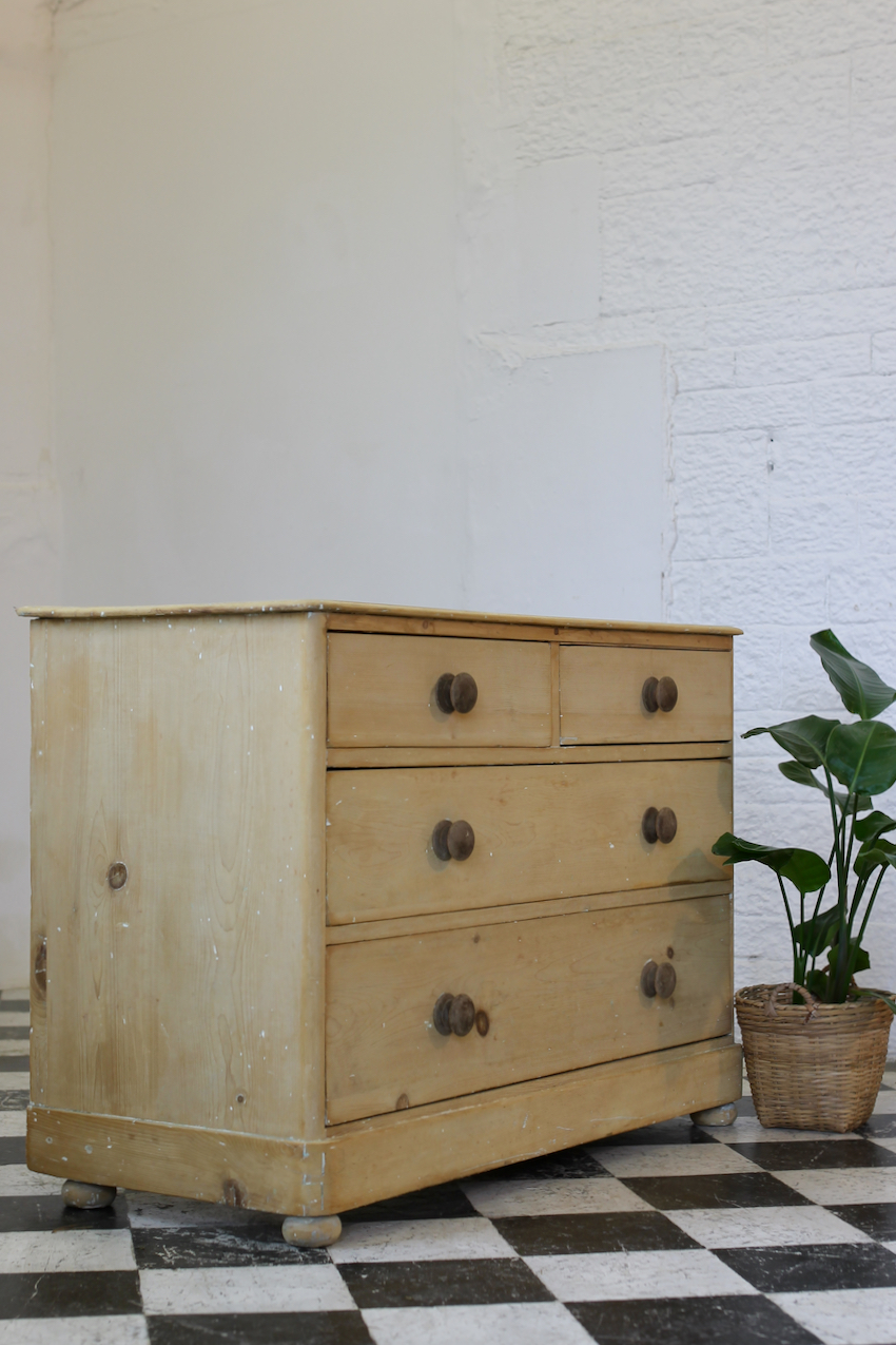 gorgeous early fine pine handscraped restored english chest with contrasting knobs original bun feet, with a natural finish.