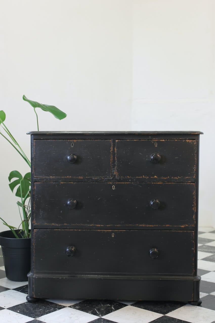 gorgeous restored pine chest with large deep drawers & painted with distressed look, black wooden knobs & flat round feet.  