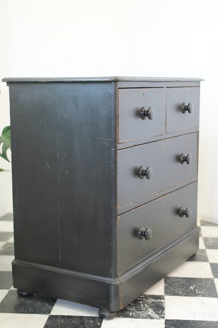 gorgeous restored pine chest with large deep drawers & painted with distressed look, black wooden knobs & flat round feet.  