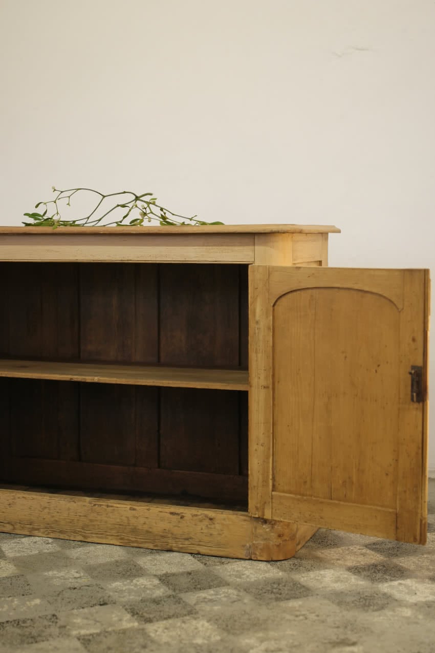 gorgeous rustic looking sympathetically restored two door fine pine cupboard with long shelf inside, lovely rounded shaping on sides and deep plinth.