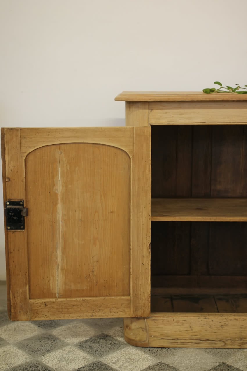 gorgeous rustic looking sympathetically restored two door fine pine cupboard with long shelf inside, lovely rounded shaping on sides and deep plinth.