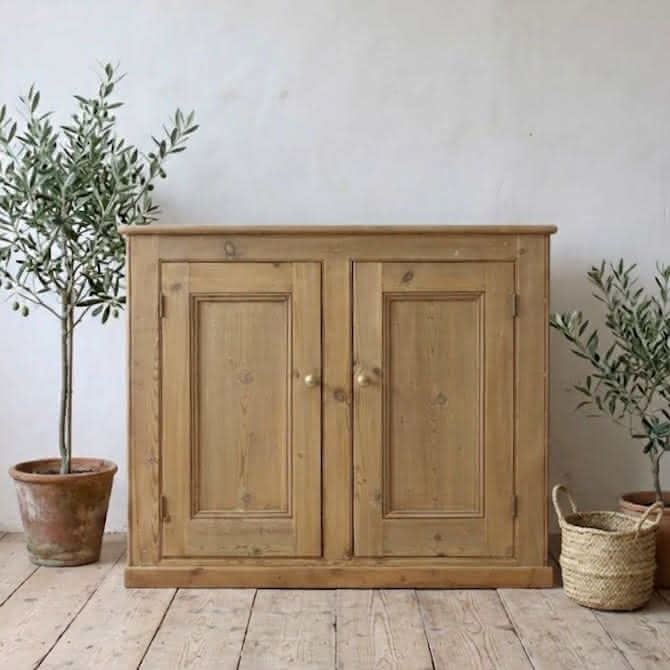 english antique two door pine cupboard base with one long shelf inside.