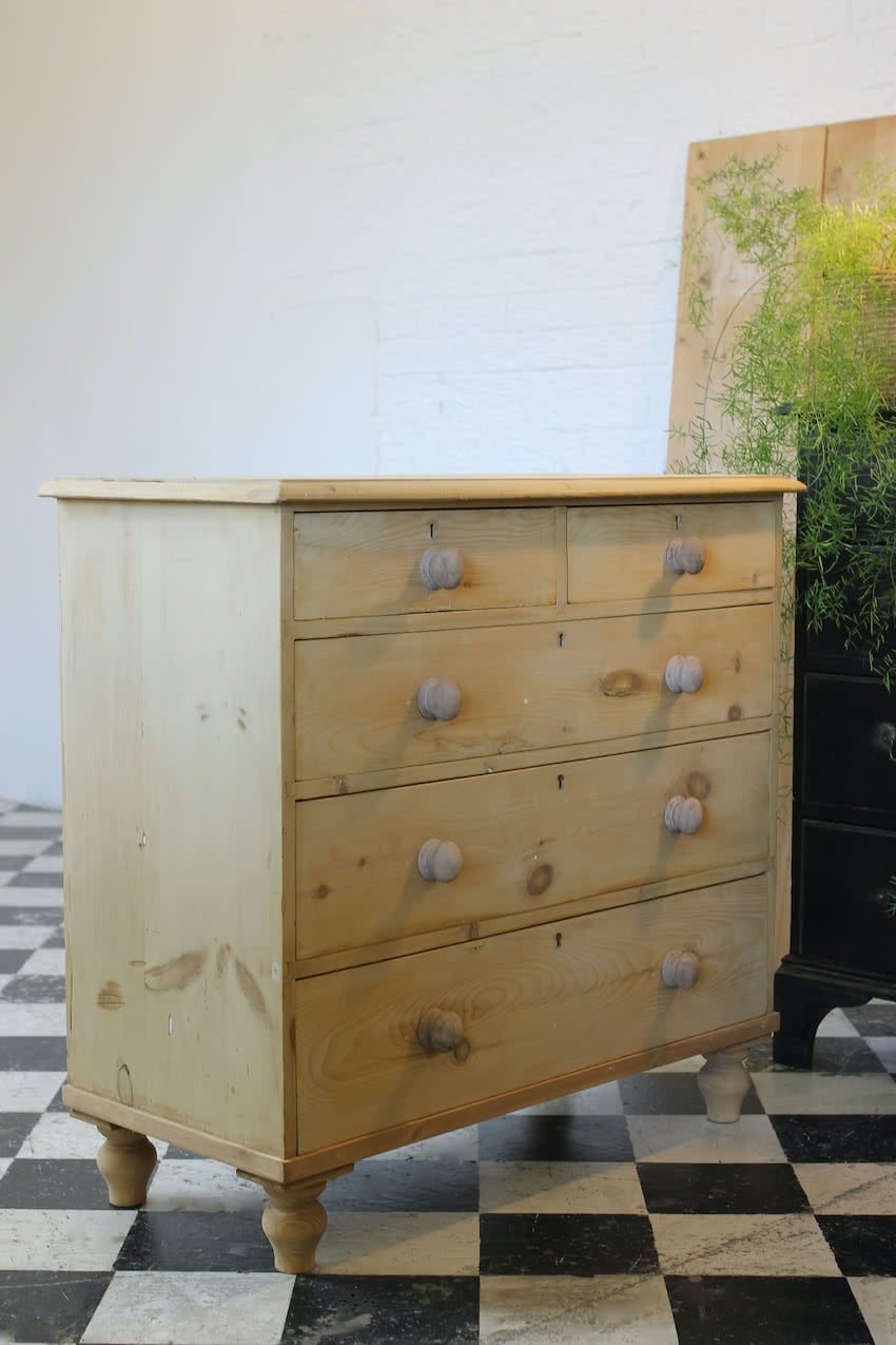 restored fine pine blonde victorian large chest of drawers with original wooden knobs and new turned tulip shaped feet.