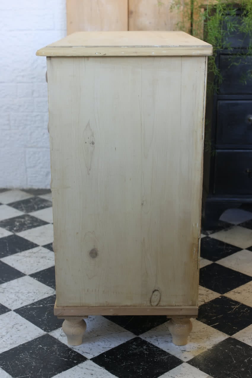 restored fine pine blonde victorian large chest of drawers with original wooden knobs and new turned tulip shaped feet.