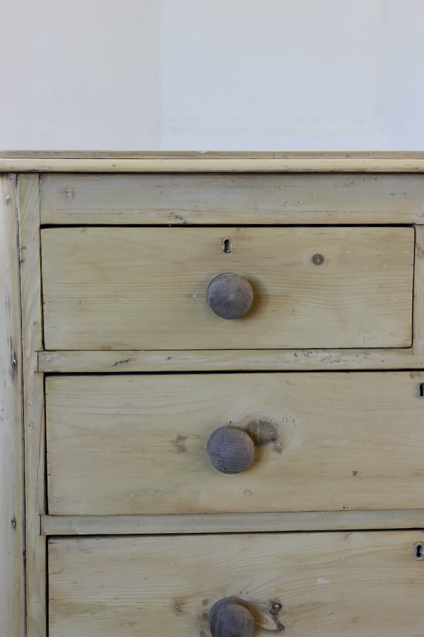 beautiful antique pine chest with five graduating drawers, wooden knobs and original feet, lovely shaped detailing too & fully restored.