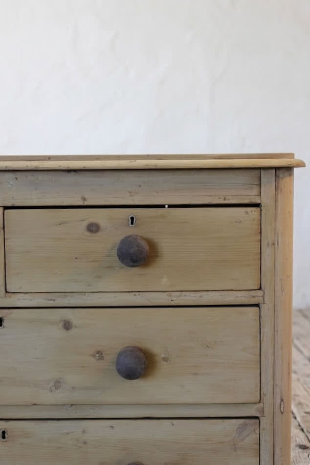 beautiful antique pine chest with five graduating drawers, wooden knobs and original feet, lovely shaped detailing too & fully restored.