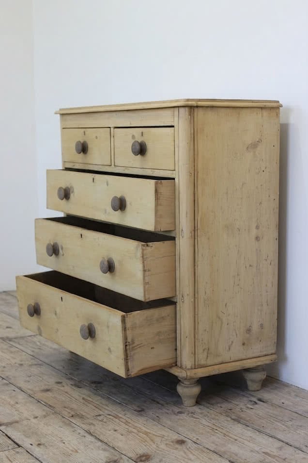 beautiful antique pine chest with five graduating drawers, wooden knobs and original feet, lovely shaped detailing too & fully restored.