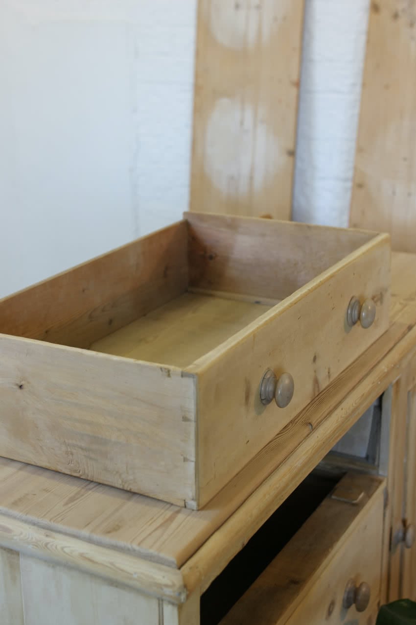 large victorian fine pine restored all original base with three drawers with wooden knobs, a cupboard, low turned feet with a fairly deep plinth & beautiful old backboards.