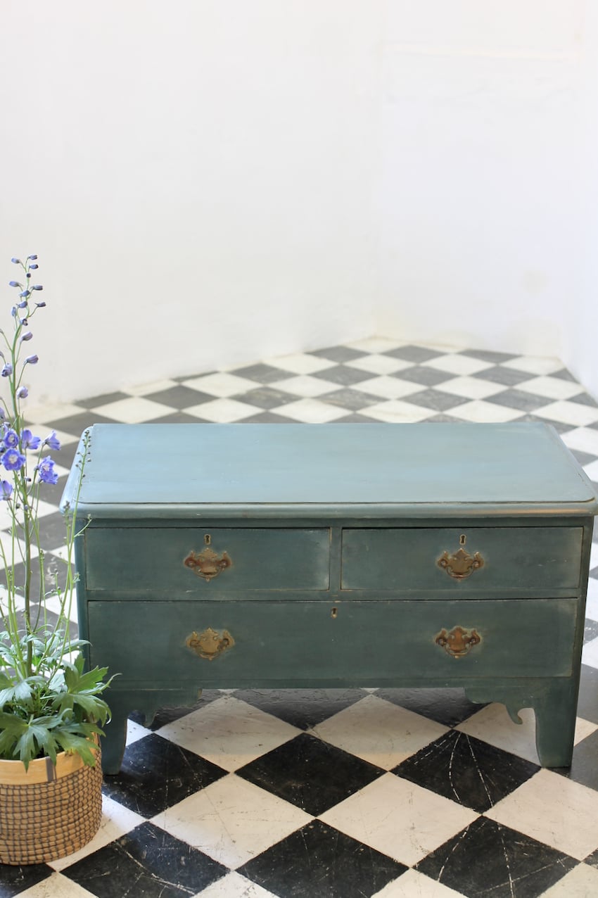 beautifully shaped low rstored and refinished english painted pine chest of drawers with brass swan neck handles & pretty shaped feet.