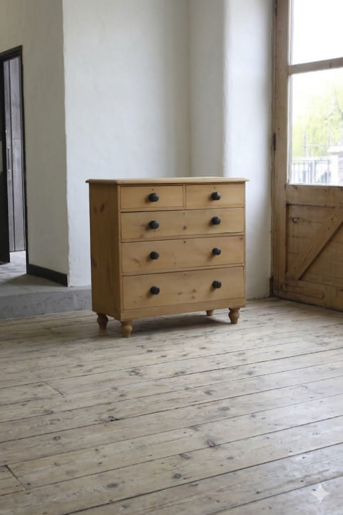 gorgeous looking stripped pine restored victorian chest with five graduating drawers & mostly original dark wooden knobs, & new feet.