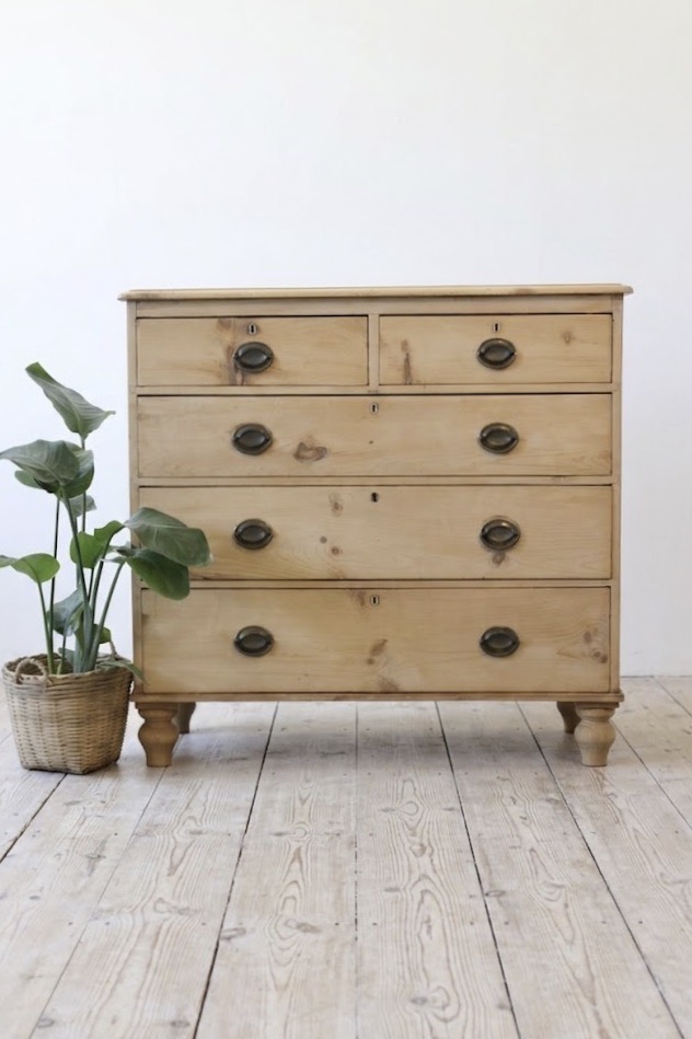restored english antique pine chest of five graduating drawers with brass oval handles & pretty new tulip shaped feet.