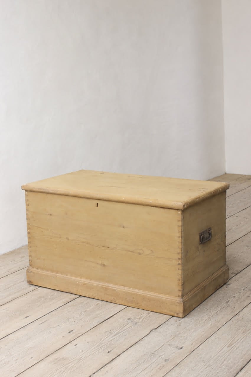 large restored pine chest with ironwork handles and hinges, also there is a candle box with the makers name dating back to 1876 in pencil.