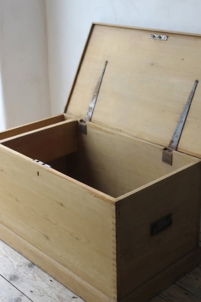 large restored pine chest with ironwork handles and hinges, also there is a candle box with the makers name dating back to 1876 in pencil.
