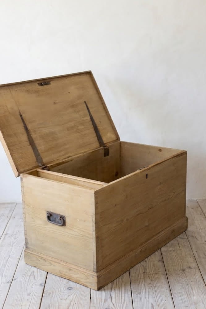 large restored pine chest with ironwork handles and hinges, also there is a candle box with the makers name dating back to 1876 in pencil.
