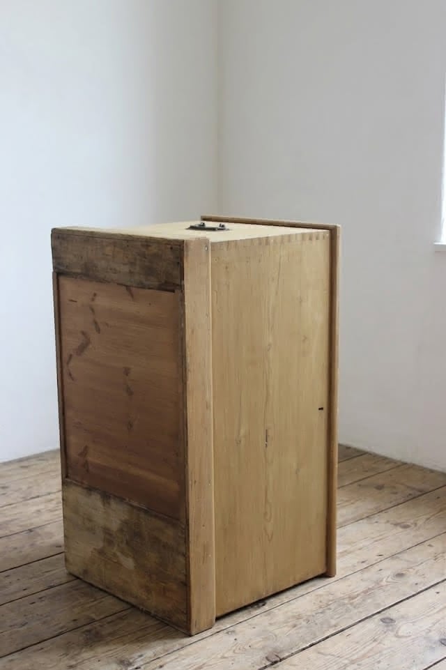 large restored pine chest with ironwork handles and hinges, also there is a candle box with the makers name dating back to 1876 in pencil.