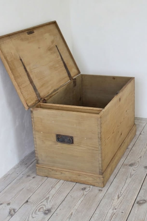 large restored pine chest with ironwork handles and hinges, also there is a candle box with the makers name dating back to 1876 in pencil.