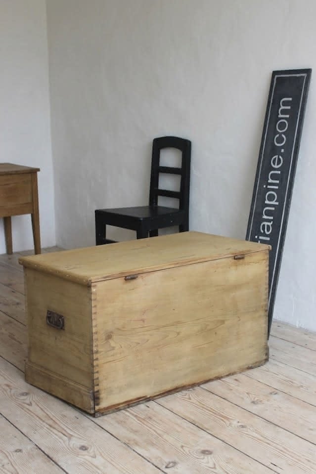 large restored pine chest with ironwork handles and hinges, also there is a candle box with the makers name dating back to 1876 in pencil.
