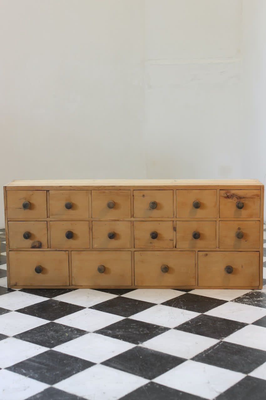 english pine bank of sixteen drawers