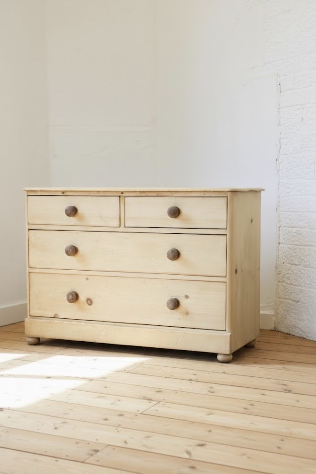 gorgeous early fine pine handscraped restored english chest with contrasting knobs original bun feet, with a natural finish.