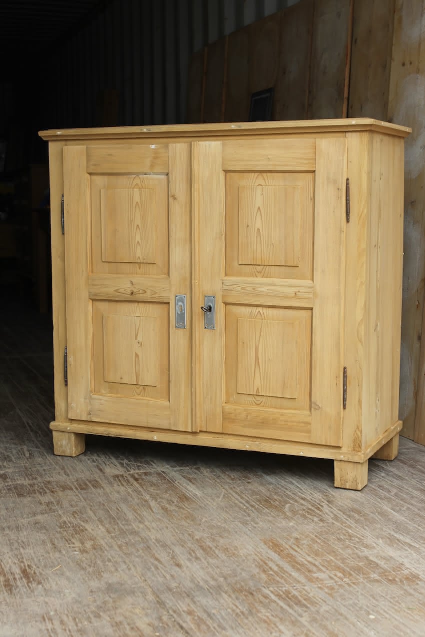 gorgeous very clean english pine cupboard two door base with one long original shelf inside and two brass round knobs.