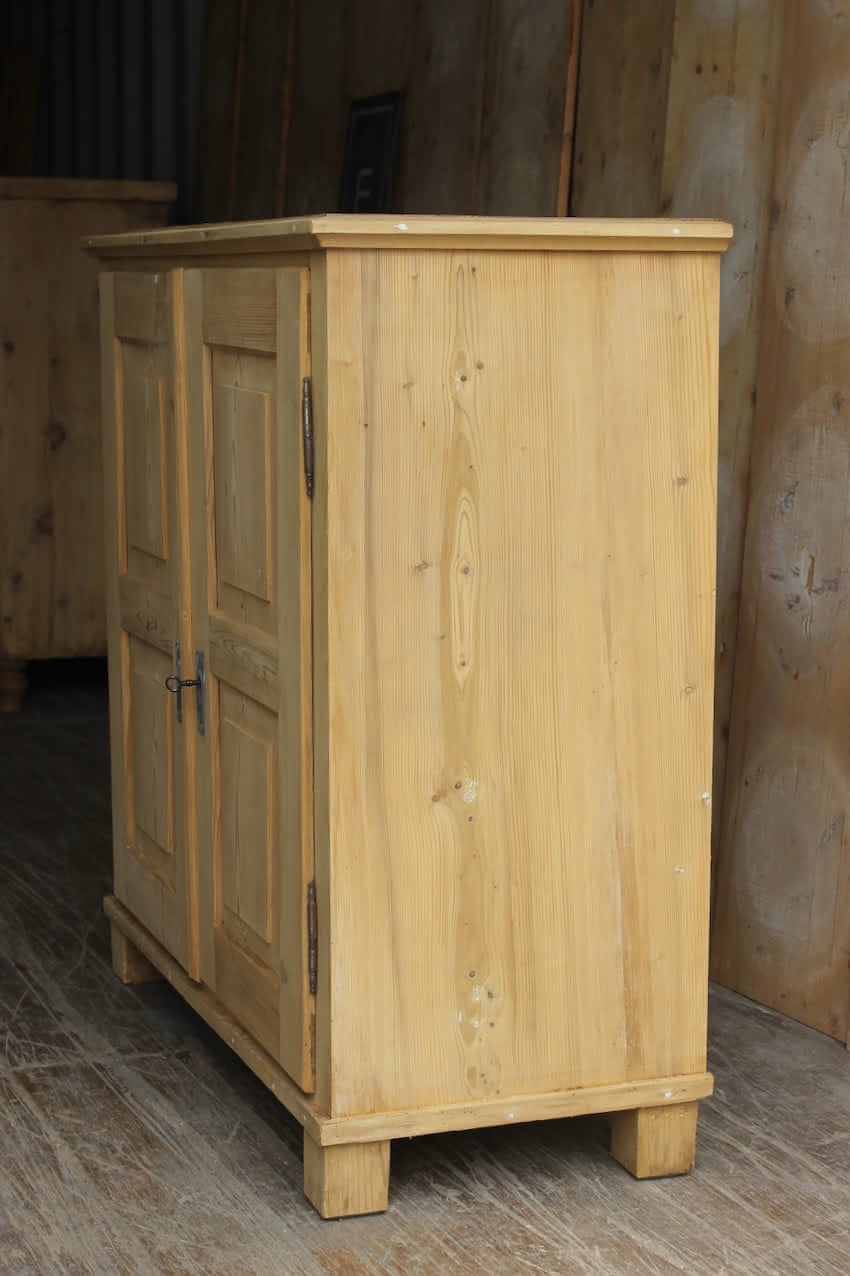 gorgeous very clean english pine cupboard two door base with one long original shelf inside and two brass round knobs.