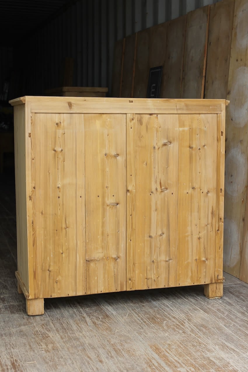 gorgeous very clean english pine cupboard two door base with one long original shelf inside and two brass round knobs.