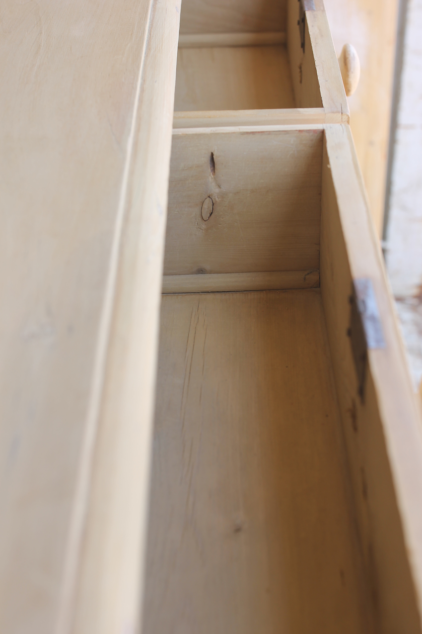 beautiful fine pine honey coloured english chest with five drawers and skirt with pretty detailing & original bun feet, very clean condition.