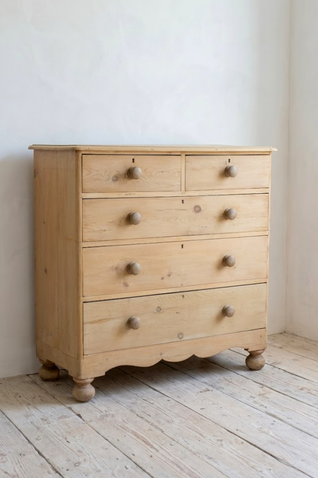 beautiful fine pine honey coloured english chest with five drawers and skirt with pretty detailing & original bun feet, very clean condition.