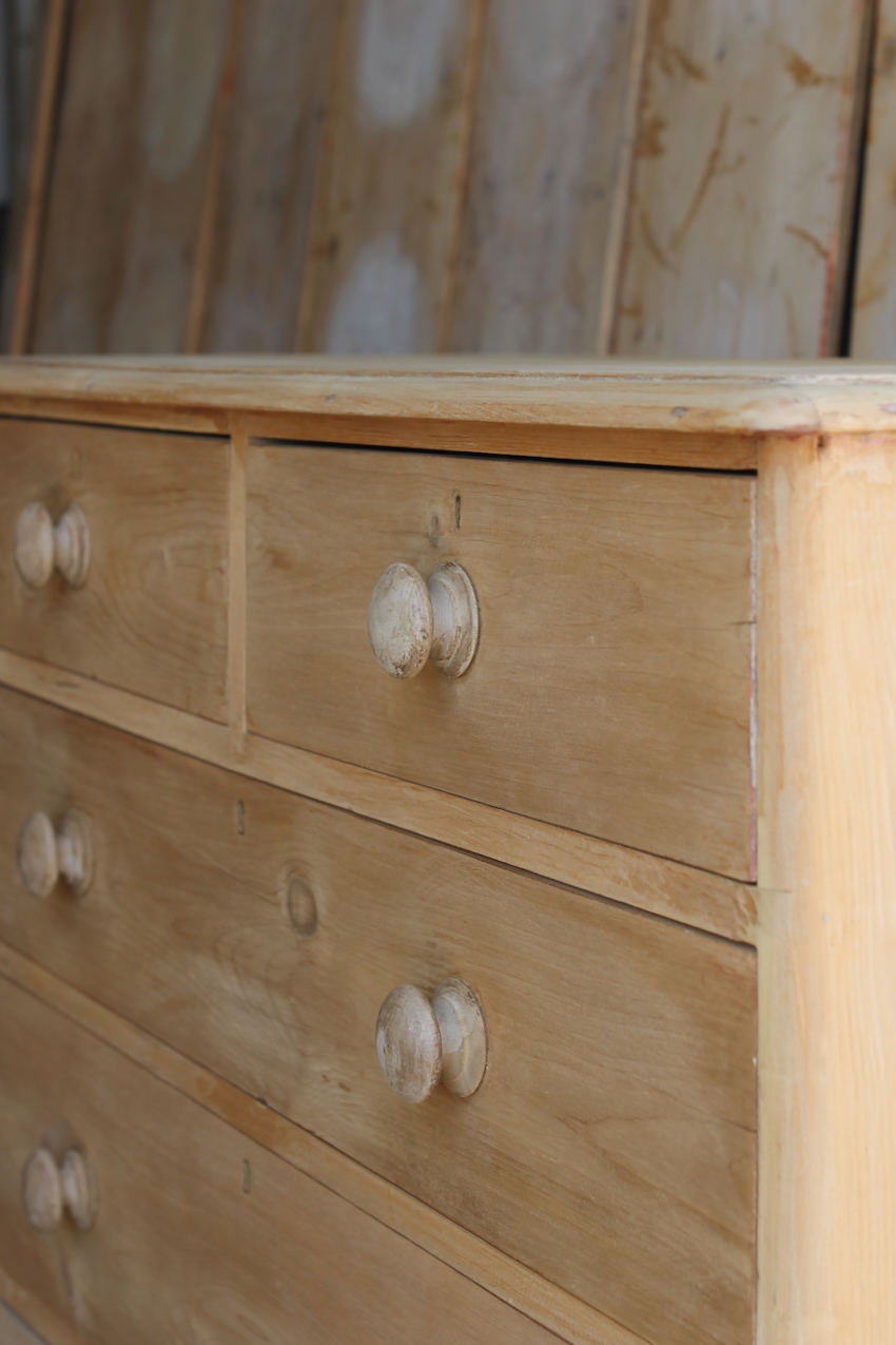beautiful fine pine honey coloured english chest with five drawers and skirt with pretty detailing & original bun feet, very clean condition.