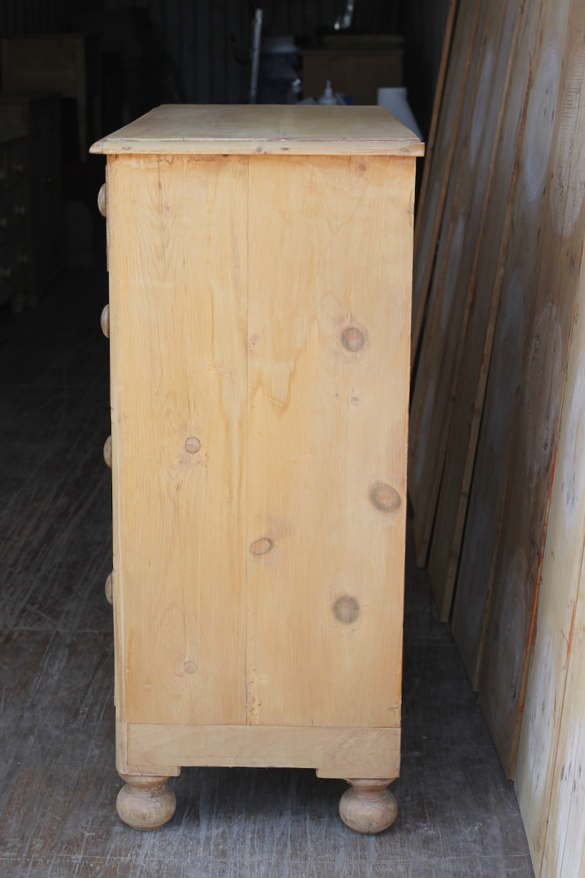 beautiful fine pine honey coloured english chest with five drawers and skirt with pretty detailing & original bun feet, very clean condition.