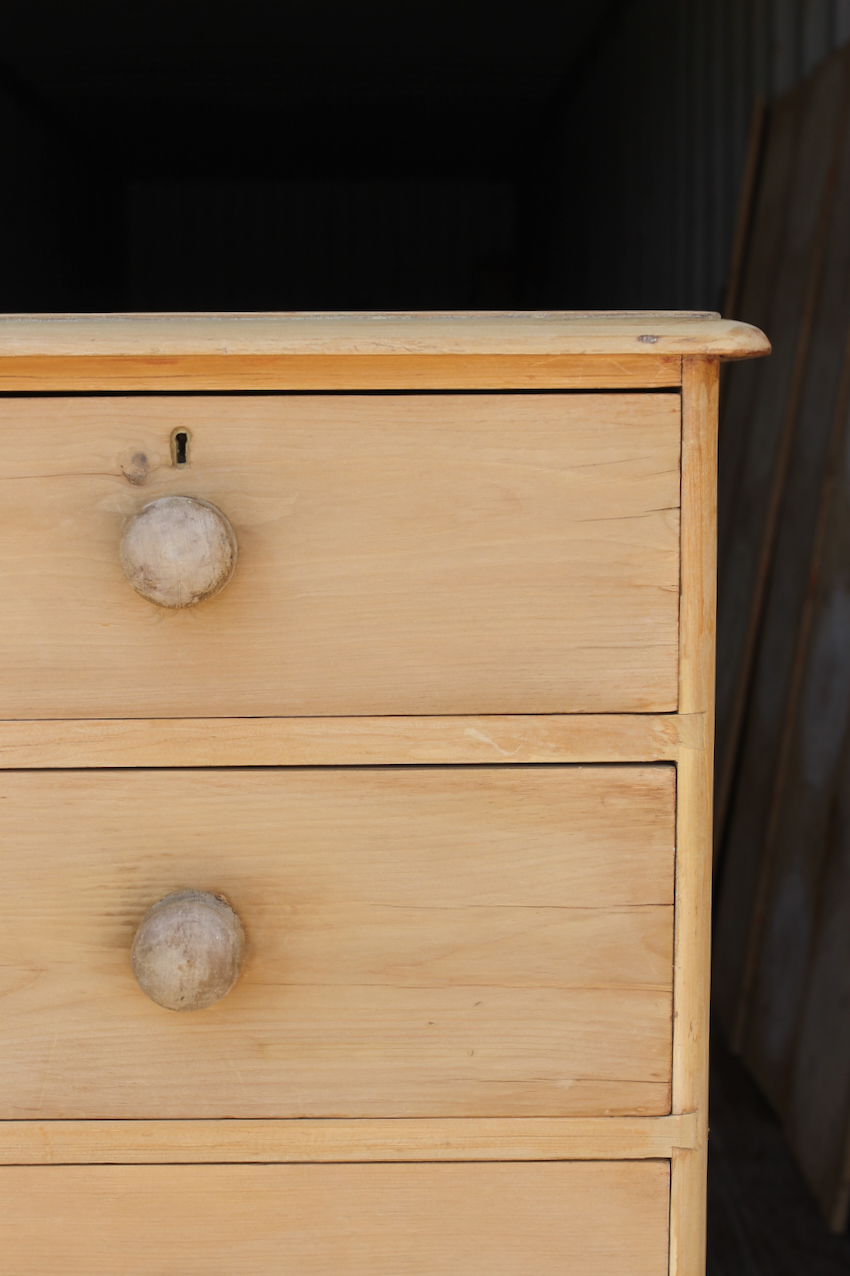 beautiful fine pine honey coloured english chest with five drawers and skirt with pretty detailing & original bun feet, very clean condition.